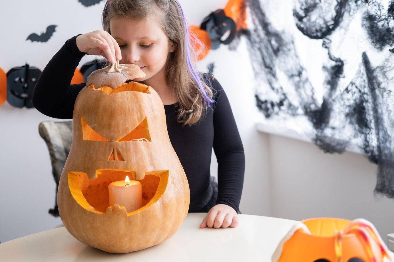 cute-girl-costume-witch-with-pumpkin-home-having-fun-celebrating-halloween_203451-3238-transformed